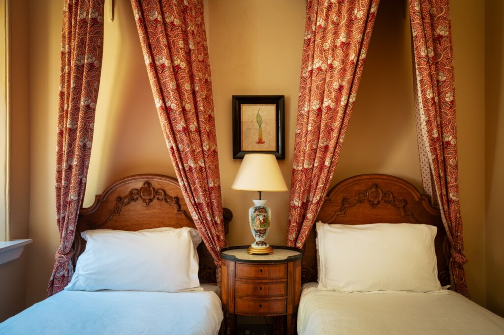 twin bed room with drapes