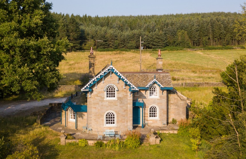 Cottage with traditional slash windows set in woodland