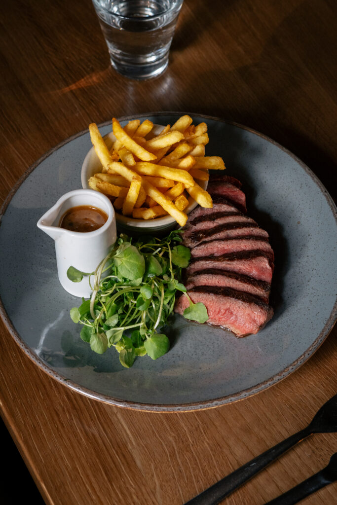 Steak, chips on a plate