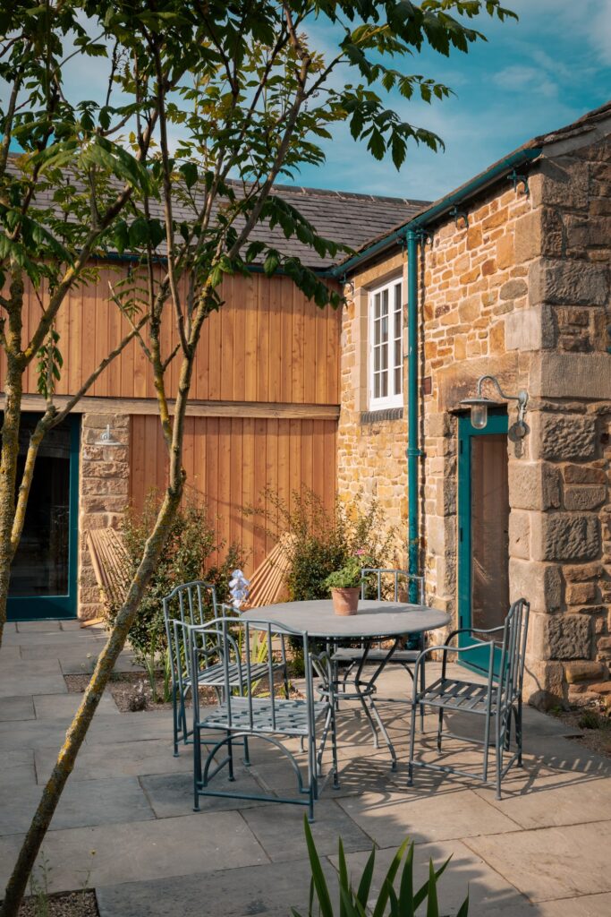 External courtyard with table and four chairs