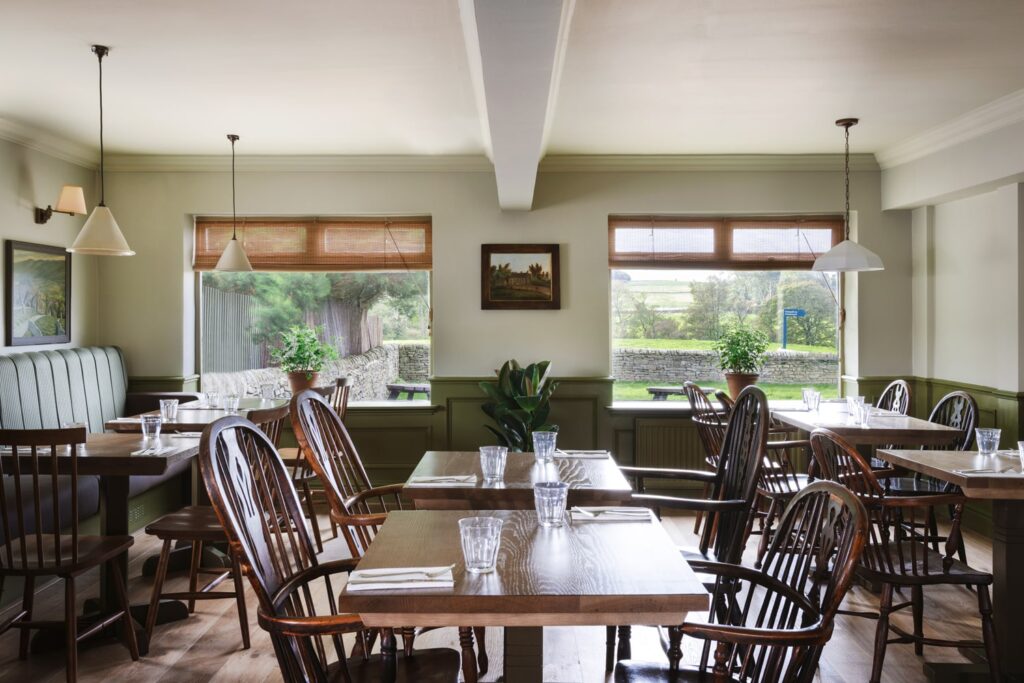 View of the tables in an airy restaurant